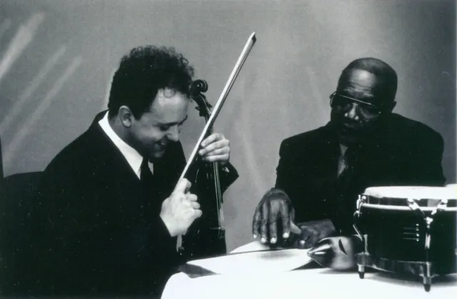 Discussing a musical score before recording