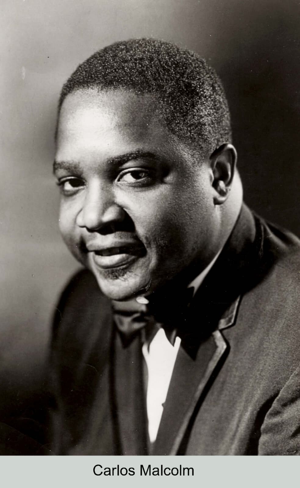 Carlos Malcolm, classic studio portrait