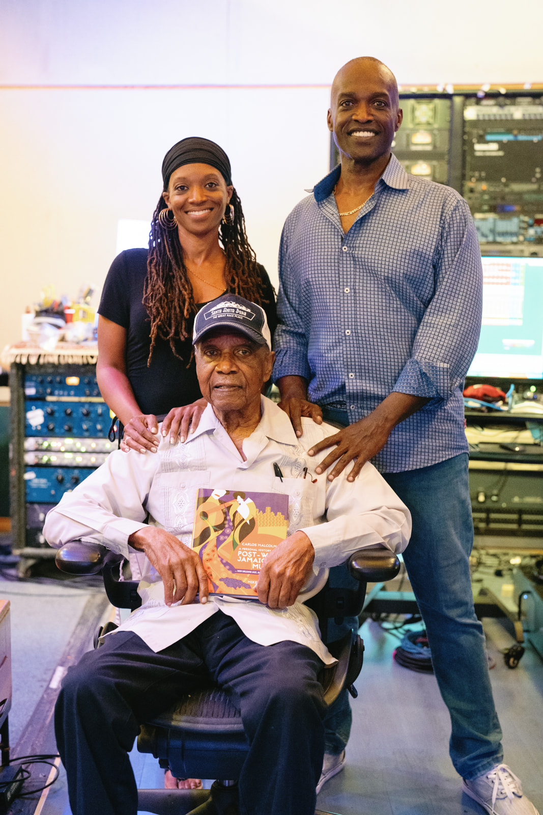 Carlos Malcolm with family, in the studio
