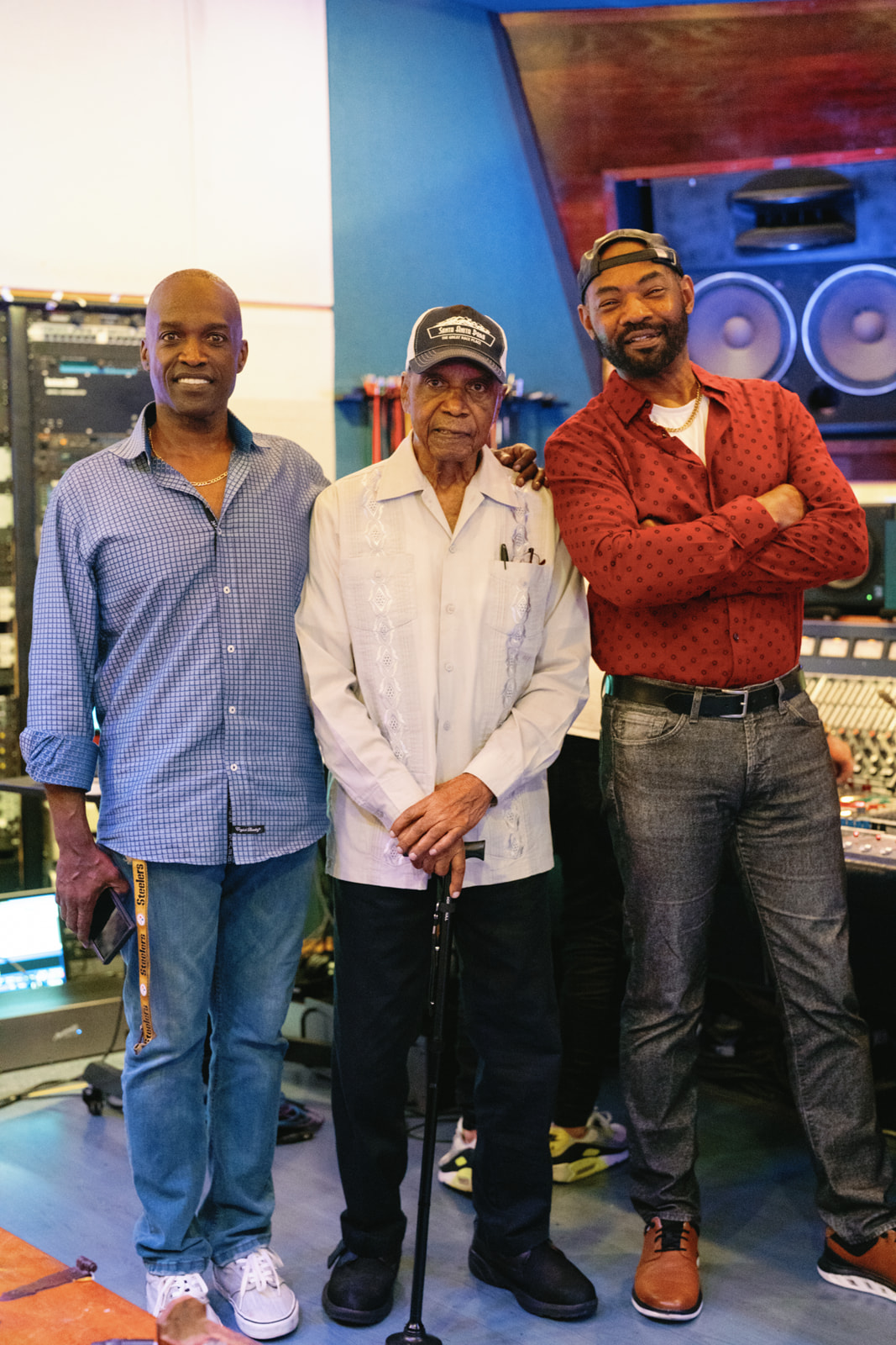 Carlos Malcolm with son Leighton, in the studio